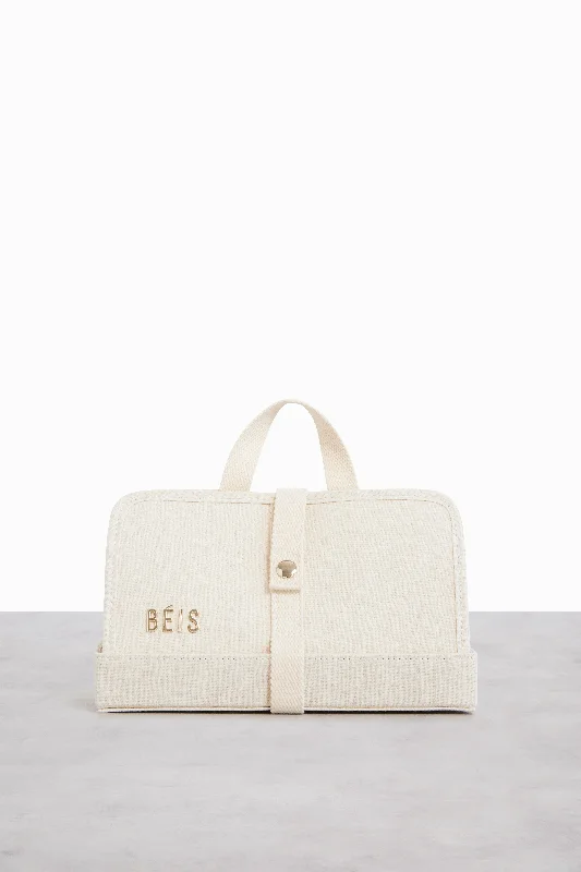 Vintage leather travel bag with brass accents for a classic and sophisticated lookThe Dope Kit